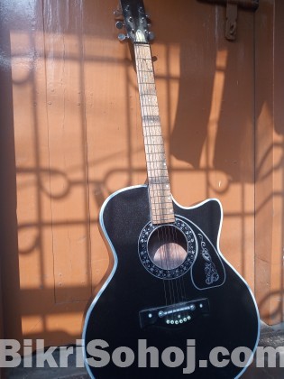 Acoustic black guitar